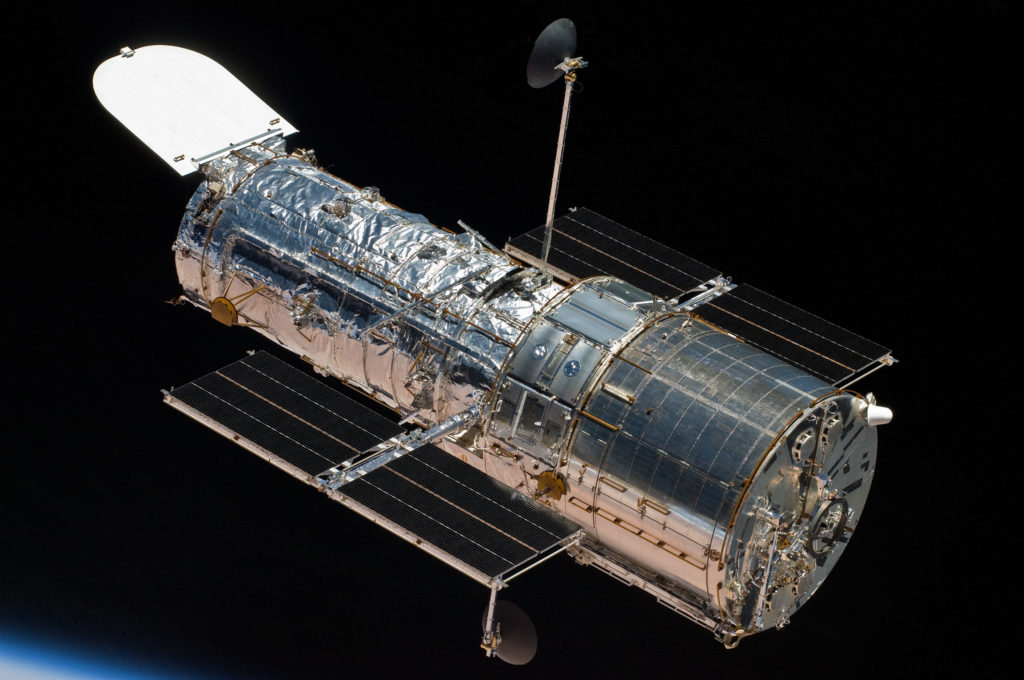 Hubble Space Telescope in Orbit in Space with Stars
