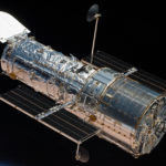 Hubble Space Telescope in Orbit in Space with Stars